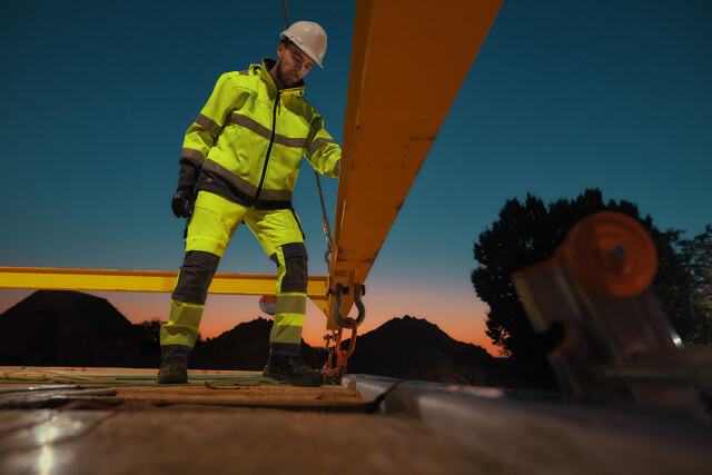 Dassy hivis aruba stretch high visibility work trouser with knee pockets malaga high visibility softshell jacket portrait